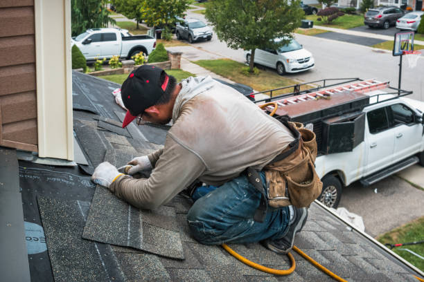 Professional Roof Repair technician working in Elmwood Park, NJ